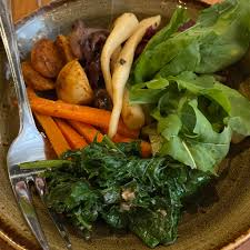 Bramble and Hare signature dishes The menu changes nightly based on the farm's harvest, but often includes dishes like Farm-Raised Pork Belly, Seasonal Vegetable Plates, and House-Made Sausages.